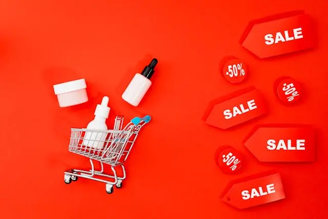 Shopping cart with items on red background symbolizing paid ads dependency.