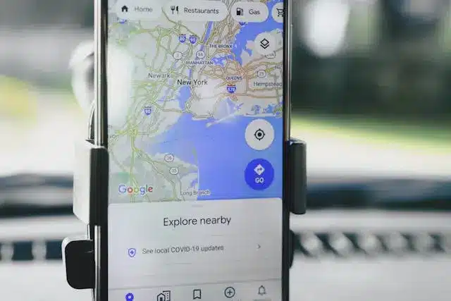 Mobile phone showing Google Maps navigation leading to a business destination, symbolizing Local SEO visibility.